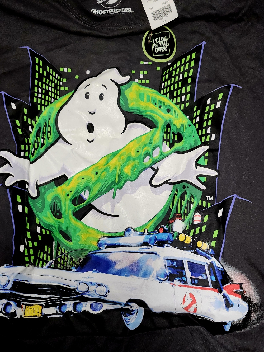 Freeze Black Ghostbusters Graphic Tee with Green Slime and White Logo